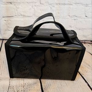 Black organizer with removable transparent pouches